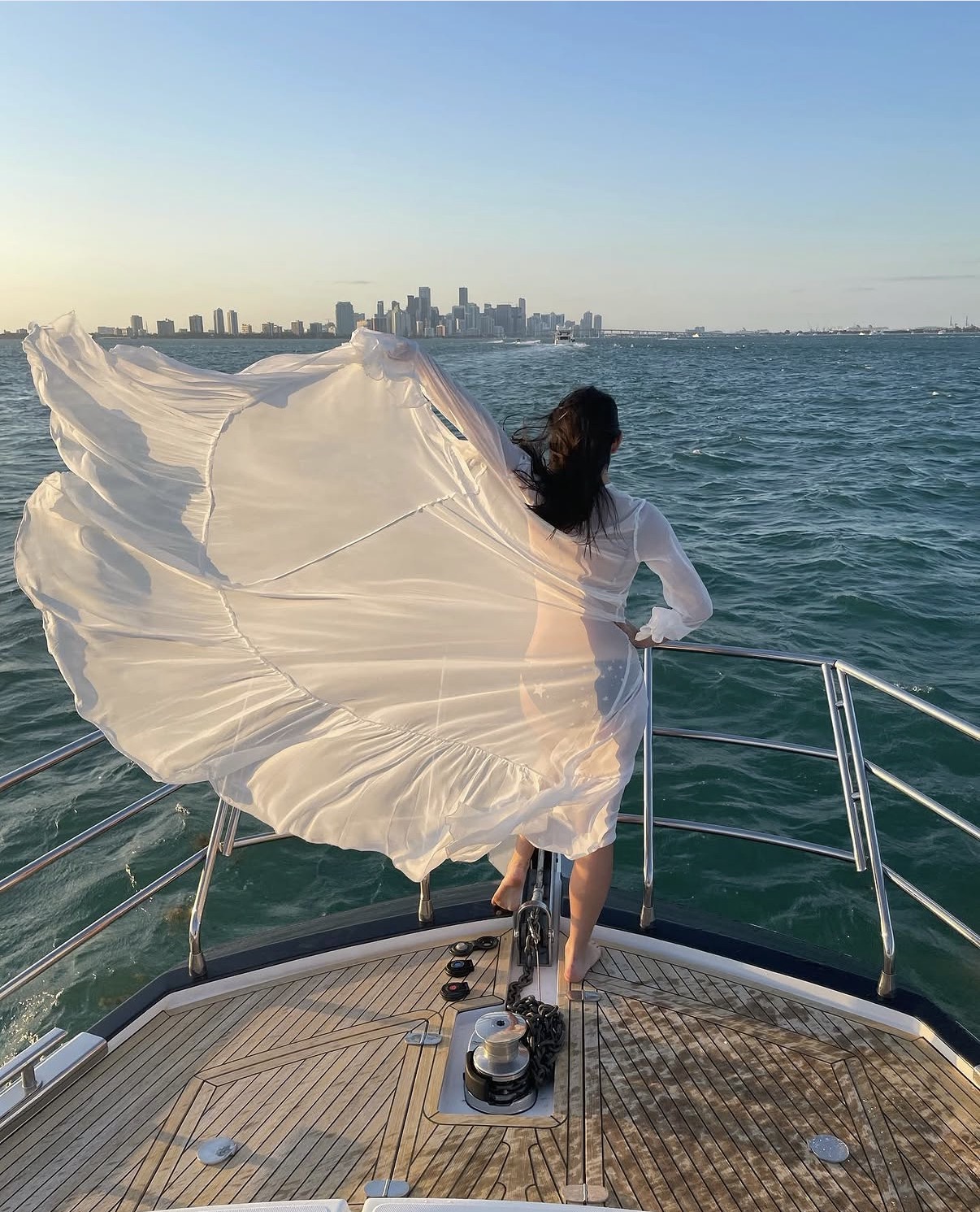 On the bow, Miami skyline behind